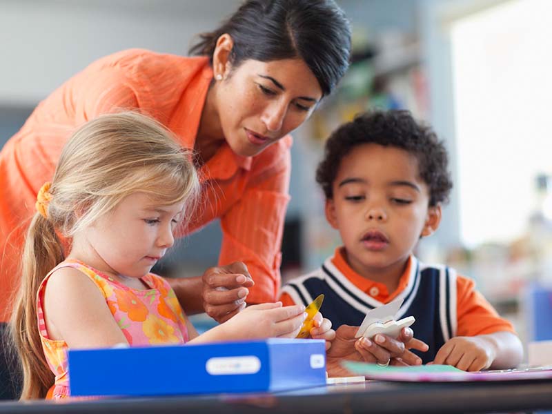 female-teacher-young-students