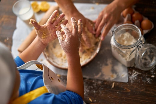 child with autism mixing ingredients